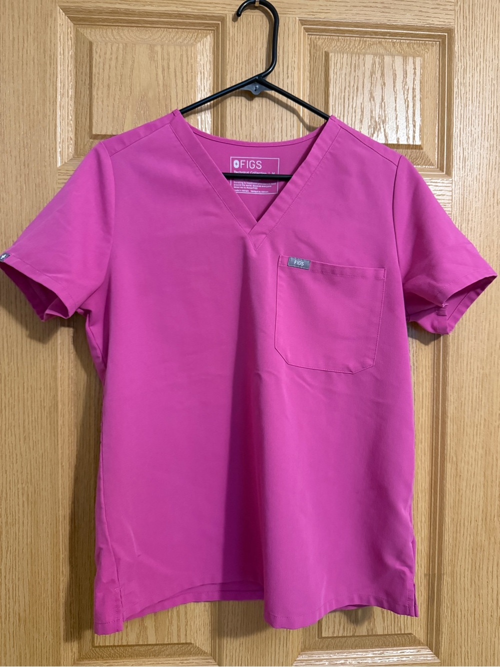 FIGS Women’s V-Neck Scrub Top in raspberry